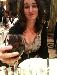 Rikki with wine at reception