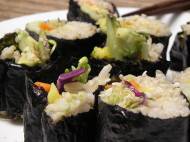 Veggie sushi: nori, jasmine rice, tahini, carrots, red cabbage, mango, avocado, cucumber, and sesame seeds